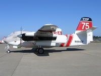 N444DF @ MCC - CDF S-2T #75 on CDF ramp at McClellan AFB, CA (black fin/red tail) - by Steve Nation