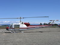 N843M @ 07CL - AVAG 1963 Bell UH-1B used for crop dusting in Sacramento Valley (no spray booms) - by Steve Nation