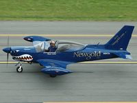 N941TA @ KOQU - rolling back after demo at 2005 Rhode Island Airshow - by Dave O'Brien