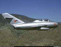 N41125 - MiG-15 UTI in flight over Mojave desert - by Mariusz Adamski