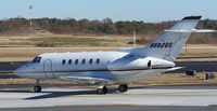 N882QS @ PDK - Taxing to Signature Air - by Michael Martin