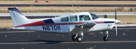 N67011 @ PDK - Just inches from touching down 20R - by Michael Martin