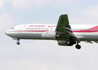 7T-VJM @ LHR - Air Algerie Boeing 737-800 (7T-VJM) landing at London (Heathrow) airport in May 2004 - by Adrian Pingstone