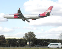 G-VSUN @ LHR - Airbus A340-313 of Virgin Atlantic on the approach to London (Heathrow) Airport in July 2002