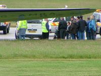 G-AMRA @ EGCC - MEDICAL EMERGENCY - AIRCRAFT HAD TO BE TOWED OFF GRASS - by mike bickley