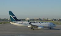 C-FKWS @ YYZ - Taxiing to the runway at Pearson International - by Micha Lueck