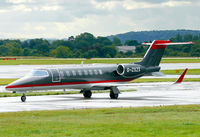 G-ZXZX @ EGCC - Mysterious looking Learjet arriving at Manchester. - by Kevin Murphy