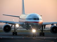 N7055A @ JFK - Pulling off the runway after aborted takoff - by Lee Mills