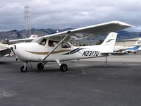 N2317U @ RHV - Blackbird Services 1999 Cessna 172R between rainstorms at Reid-Hillview Airport, San Jose, CA - by Steve Nation