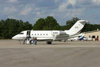 N39RE @ DWH - canadair ltd 600 unloading - by thomas l hughes