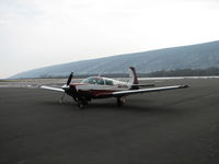 N231BL @ IPT - Sitting on the ramp at IPT.  Bald Eagle mountain in the distance - by Sam Andrews