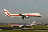 CS-TJF @ BRU - landing of TAP A321 while N351AA - flight AA89 - waits to take-off to ORD - by Daniel Vanderauwera