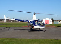 G-BRXV @ EGBO - Robinson R22 Beta  (Halfpenny Green) - by Robert Beaver