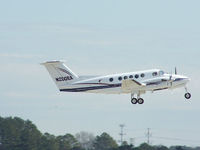 N200EA @ PDK - Departing PDK - Starting to rotate gear. - by Michael Martin