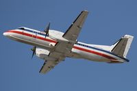 N397AE @ LAX - American Eagle N397AE (Saab 340) departing LAX RWY 25R. - by Dean Heald