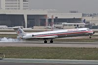 N592AA @ LAX - American Airlines N592AA touching down on RWY 7R. - by Dean Heald