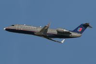 N916SW @ LAX - United Express N916SW departing RWY 25R. - by Dean Heald