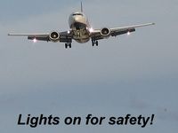 UNKNOWN @ KLAS - Lights on for safety - by Brad Campbell