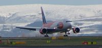 G-SJMC @ MIA - touchdown on a winters day - by mike bickley