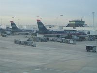 N711UW @ CLT - Two A319s of US Airways at Charlotte, NC - by Micha Lueck