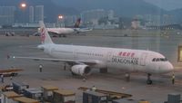B-HTF @ HKG - Waiting for a late departure - by Micha Lueck