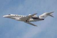 N932QS @ LAX - Cessna Citation X - N932QS (FLT EJA932) - climbing out from LAX RWY 25L enroute to Asheville Regional Airport (KAVL) - Asheville, North Carolina. - by Dean Heald