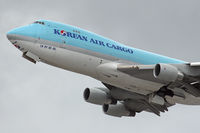 HL7601 @ LAX - Close-up shot of Korean Air Cargo HL7601 (FLT KAL8206) - Boeing 747-4B5F (SCD) - departing LAX RWY 25L on an overcast day enroute to Incheon International Airport (RKSI) - Seoul, Korea. - by Dean Heald
