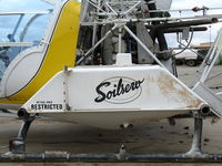 N4348P @ SNS - Close-up of tank and Soilserv titles on Bell 47G-5 sprayer at Salinas, CA - by Steve Nation