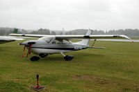 N307AL @ ESKB - Seen in the rain during Swedish EAA Fly-in at Barkarby airport in Stockholm - by Henk van Capelle