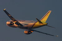 D-AKNG @ BUD - Taking off into the sunset from BUD - by Imre Der