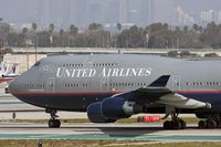 N117UA @ LAX - United Airlines N117UA holding short of RWY 25R after arriving on 25L. - by Dean Heald
