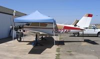 N5274P @ E27 - Gets hot in Sacramento in August -- 1958 PA-24-250 under tent at Elk Grove, CA - by Steve Nation