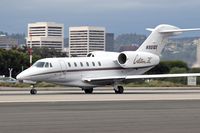 N901QS @ SMO - NetJets N901QS starting her takeoff roll on SMO RWY 21 enroute to a short hop to LAX. - by Dean Heald