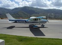 N1402S @ SZP - 1976 Cessna 182P SKYLANE, Continental O-470-S 230 Hp, taxi to hangar after refueling - by Doug Robertson