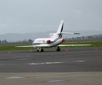 N700MP @ APC - Hop Air One Group 1981 Dassault Falcon 50 @ rainy Bridgeford A/S ramp Napa County Airport, CA - by Steve Nation