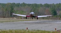 N9597M @ PVG - The Mooney is away, just moments from wheels in the wells - by Paul Perry