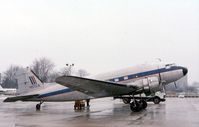 N105CA @ DPA - C-47B 43-48459 on a snowy and windy operation - by Glenn E. Chatfield