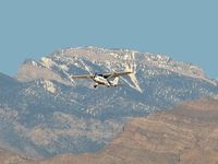N2021W @ VGT - Elite Door & Window / 2003 Cessna 172S (Skyhawk) with 'Mummy' Mtn in background. - by Brad Campbell