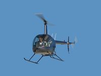 N212SH @ VGT - Owned by Robinson Helicopter Co. / 2005 Robinson Helicopter R22 BETA / Perhaps that is Mrs. Robinson in the driver's seat?