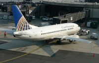 N11656 @ EWR - One of Continental's baby Boeing's basks in the humid July sun at Newark - by Daniel L. Berek