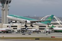 EI-EWR @ LAX - Aer Lingus EI-EWR - St. Laurence O'Toole -  (FLT EIN144) departing RWY 25R enroute to Dublin (EIDW), Ireland. - by Dean Heald