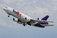 N562FE @ LAX - FedEx N562FE (FLT FDX3019) climbing out from RWY 25L enroute to Chicago Ohare Int'l (KORD), Illinois. - by Dean Heald