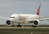 A6-EBD @ EGCC - Emirates fine looking B.777 waiting at the threshold of 24L. - by Kevin Murphy