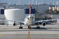 HB-JMG @ LAX - Swiss International Airlines HB-JMG (FLT SWR40) on Taxiway Tango after crossing RWY 25R. - by Dean Heald