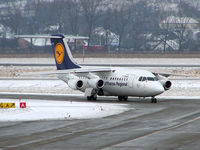 D-AVRO @ KRK - Lufthansa - taxing via G to the apron - by Artur Bado?