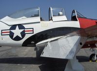 N28RF @ SZP - North American T-28B TROJAN, Wright Cyclone R-1820-86 9 cylinder radial 1,425 Hp, dual cockpits, huge flaps extended, underfuselage air brake retracted - by Doug Robertson