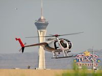 N58431 @ VGT - LVMPD / 1979 Hughes 369D - Stratosphere in background - by SkyNevada - Brad Campbell