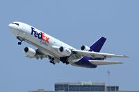 N394FE @ LAX - Fed Ex N394FE (FLT FDX3019) departing RWY 25R enroute to Chicago Ohare Int'l (KORD), Illinois. - by Dean Heald