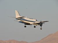 N68TA @ VGT - Ameriflight / 1982 Beech C-99 / The 'C' stands for 'Commuter' but in this case it should be 'Cargo' - that's what Ameriflight does. And, I don't know what the object is above plane. Probably something out of Nellis to the east.