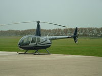 G-IFDM @ QUG - Robinson R44 Astro - by Gerald Shimbart